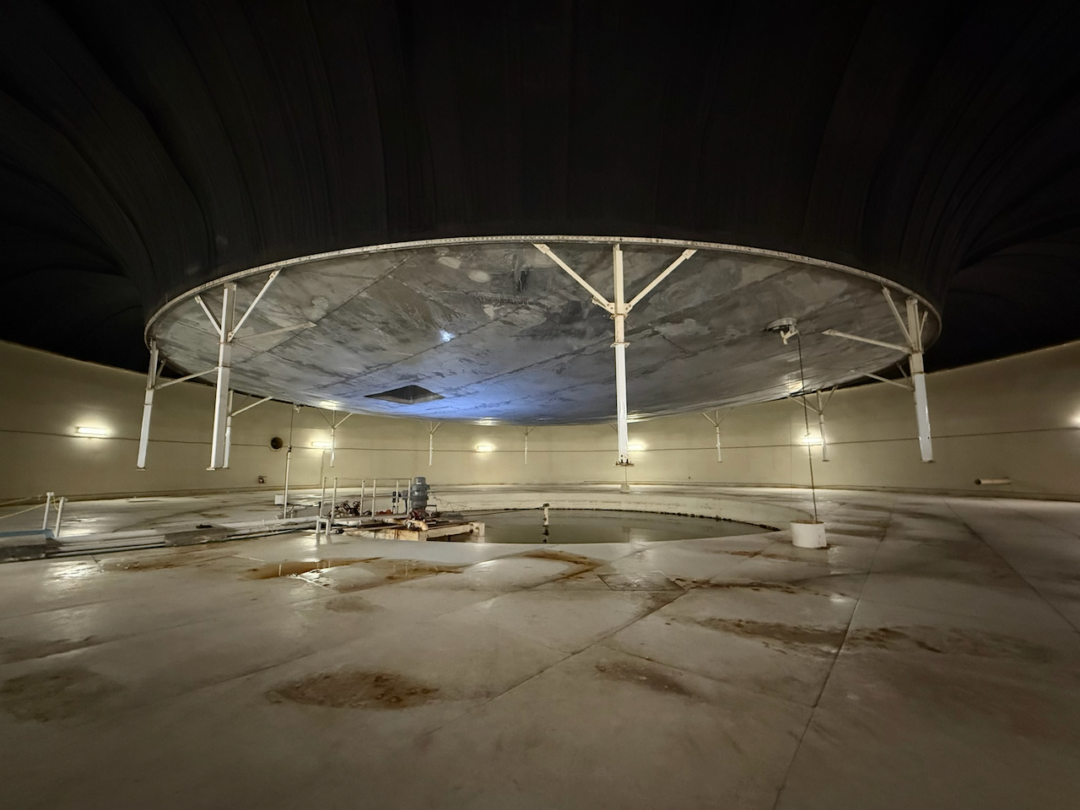 The black part is a special kind of rubber. The legs started on the ground and then slowly raised.